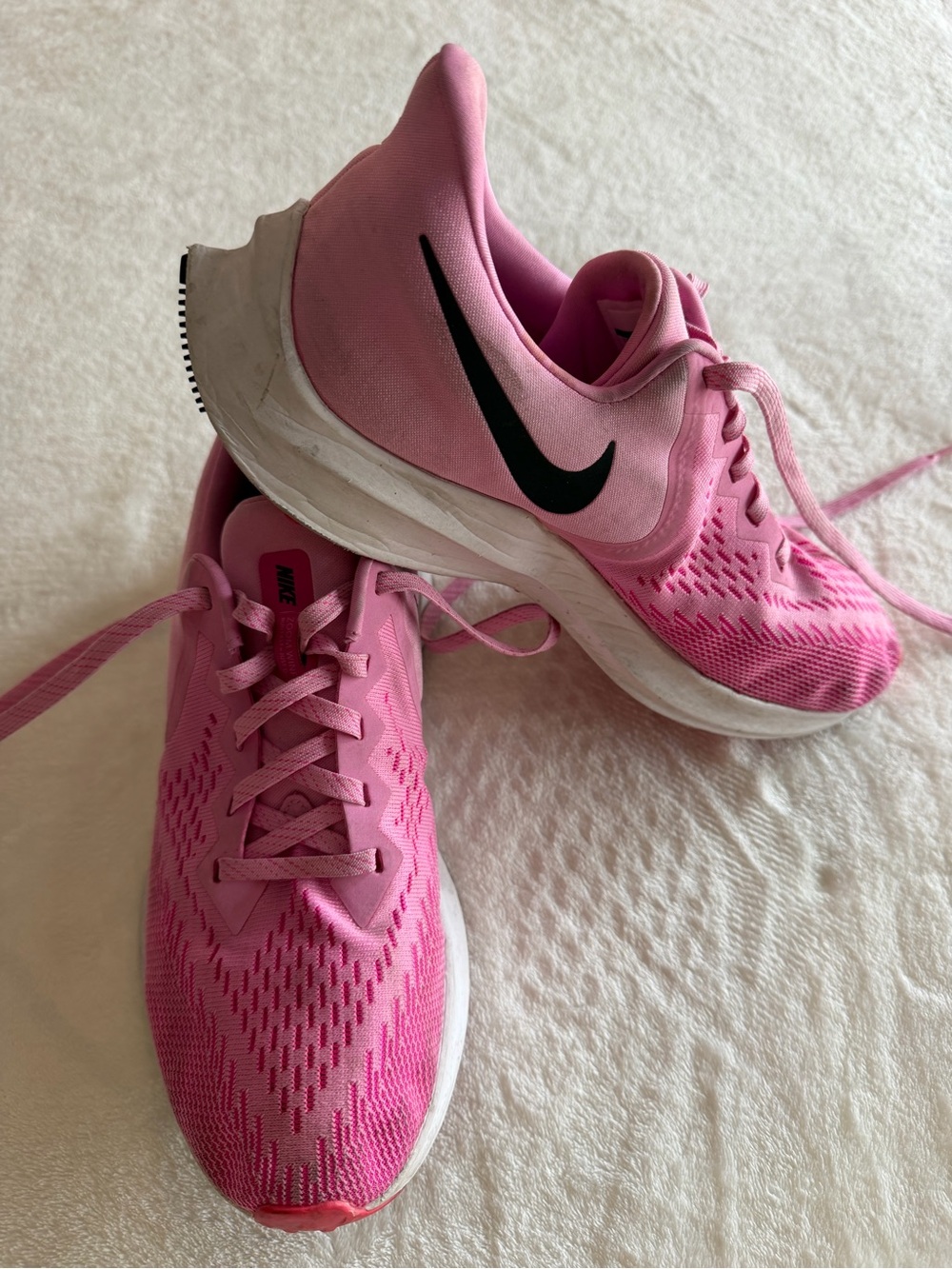 Nike Women’s Pink Athletic Running Shoes with Black Swoosh